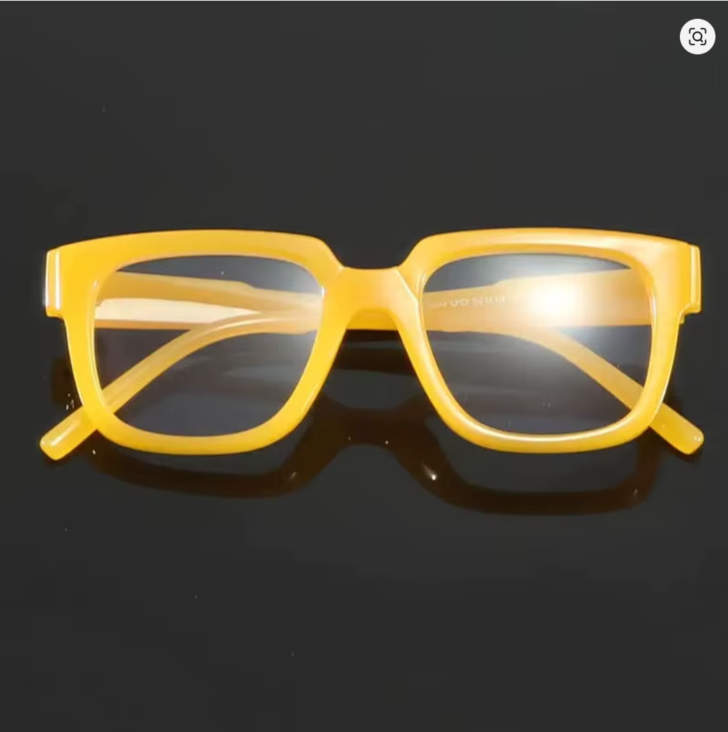 Gafas amarillas de moda con marco grande