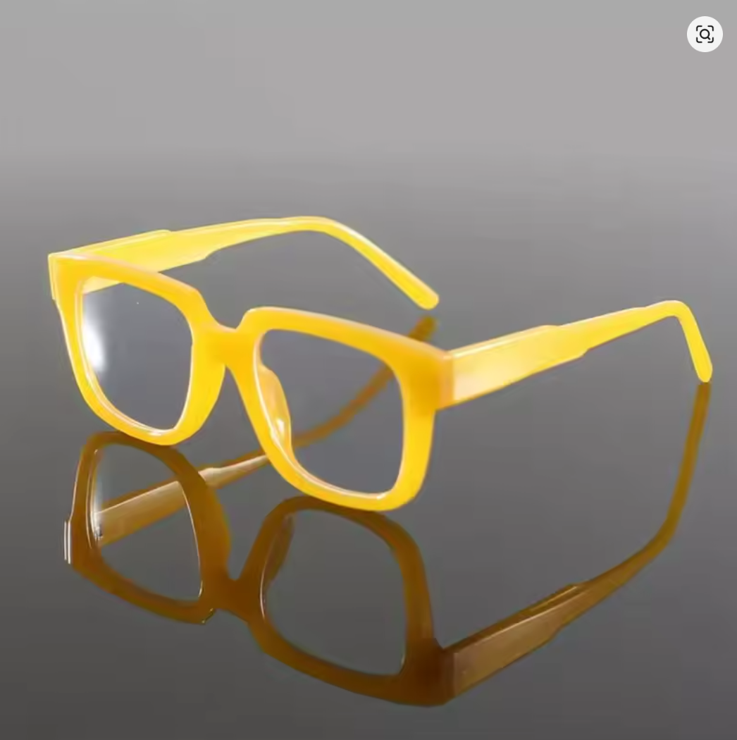 Gafas amarillas de moda con marco grande